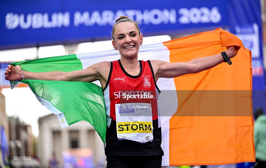 25 October 2026; Women's National champion Judith Storm of Ireland celebrates after the 2026 Irish Life Dublin Marathon, as thousands of runners took to the streets of Dublin for the 45th running of the event. Photo by Sam Barnes/Sportsfile