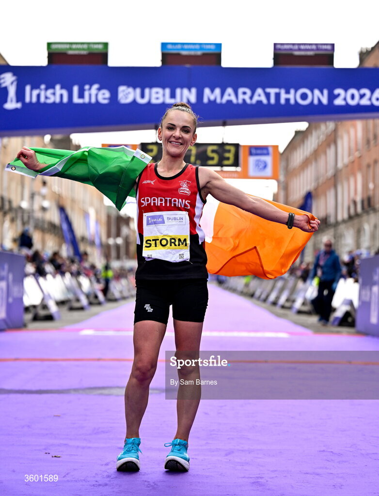 25 October 2026; Women's National champion Judith Storm of Ireland celebrates after the 2026 Irish Life Dublin Marathon, as thousands of runners took to the streets of Dublin for the 45th running of the event. Photo by Sam Barnes/Sportsfile