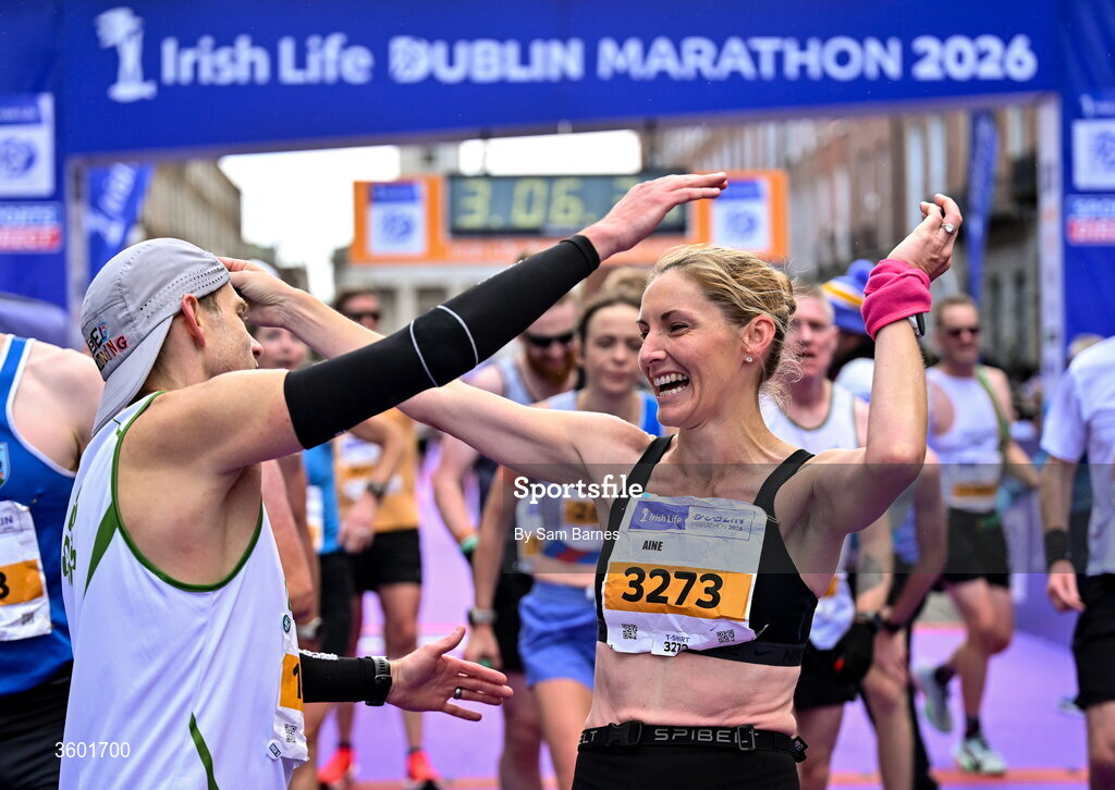 25 October 2026; Simon Keegan of Togher AC, Cork, left, and Aine O' Connell during the 2026 Irish Life Dublin Marathon, as thousands of runners took to the streets of Dublin for the 45th running of the event. Photo by Sam Barnes/Sportsfile