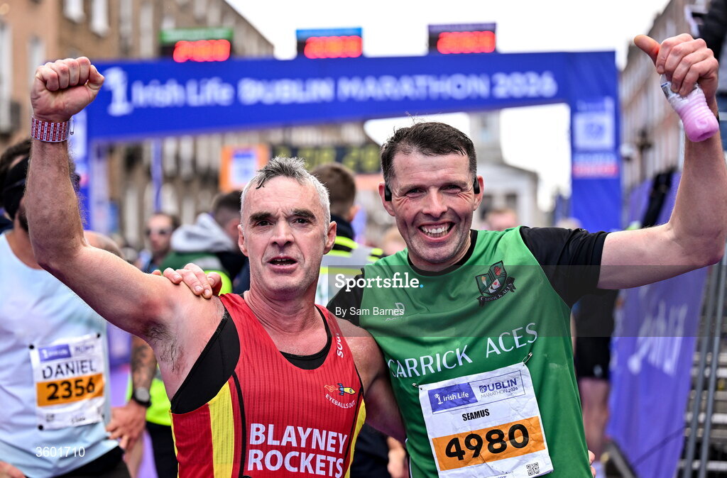 25 October 2026; Derek Callan of Blayney Rockets AC, Monaghan, left, and Seamus Meehan of Carrick Aces AC, Monaghan, during the 2026 Irish Life Dublin Marathon, as thousands of runners took to the streets of Dublin for the 45th running of the event. Photo by Sam Barnes/Sportsfile