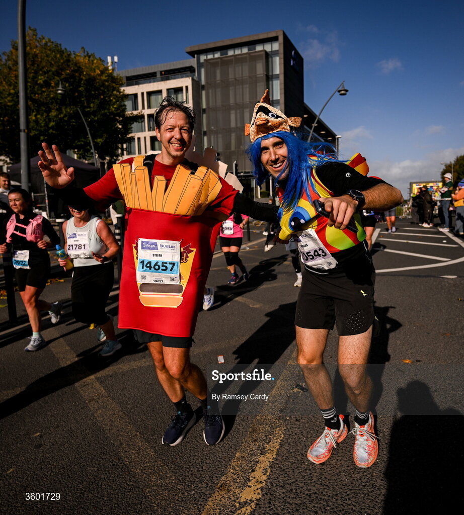 25 October 2026; Andreas Eichenmann, right, and Stefan Holschbach during the 2026 Irish Life Dublin Marathon, as thousands of runners took to the streets of Dublin for the 45th running of the event. Photo by Ramsey Cardy/Sportsfile