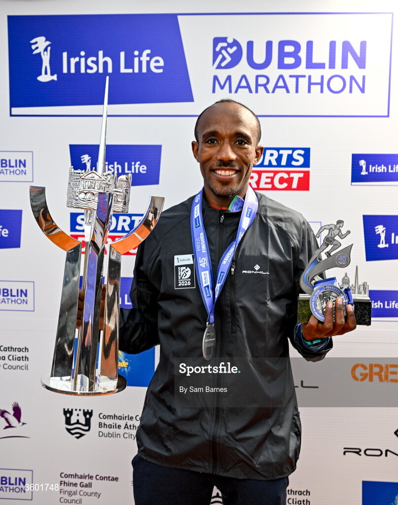 25 October 2026; Men's overall winner Abay Alemu Lesa of Ethiopia with the Noel Carroll Cup during the 2026 Irish Life Dublin Marathon, as thousands of runners took to the streets of Dublin for the 45th running of the event. Photo by Sam Barnes/Sportsfile