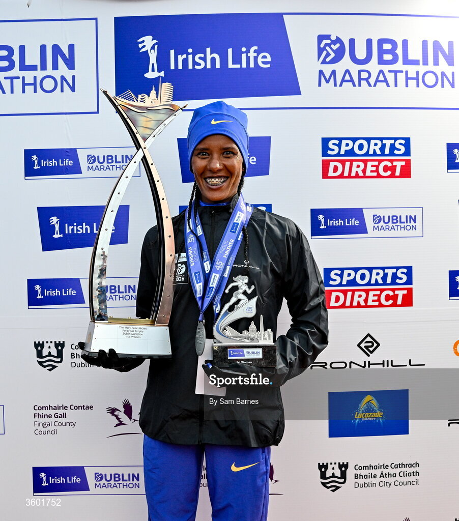25 October 2026; Women's overall winner Zenebu Fikdau Jebesa of Ethiopia with the Mary Nolan-Hickey cup during the 2026 Irish Life Dublin Marathon, as thousands of runners took to the streets of Dublin for the 45th running of the event. Photo by Sam Barnes/Sportsfile