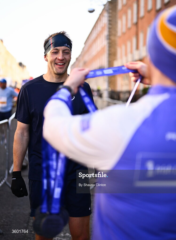 25 October 2026; Participants receive their finishers medals during the 2026 Irish Life Dublin Marathon, as thousands of runners took to the streets of Dublin for the 45th running of the event. Photo by Shauna Clinton/Sportsfile