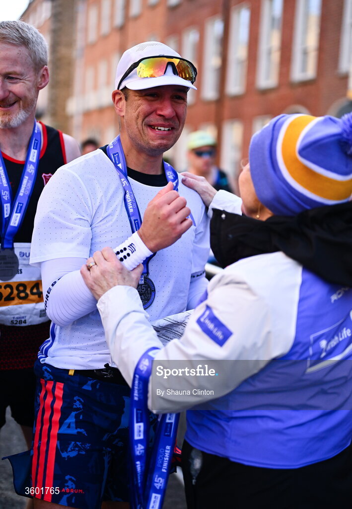 25 October 2026; Participants receive their finishers medals during the 2026 Irish Life Dublin Marathon, as thousands of runners took to the streets of Dublin for the 45th running of the event. Photo by Shauna Clinton/Sportsfile