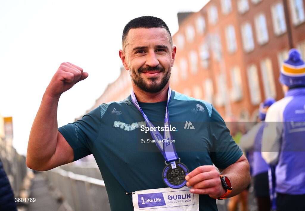 25 October 2026; Participants receive their finishers medals during the 2026 Irish Life Dublin Marathon, as thousands of runners took to the streets of Dublin for the 45th running of the event. Photo by Shauna Clinton/Sportsfile