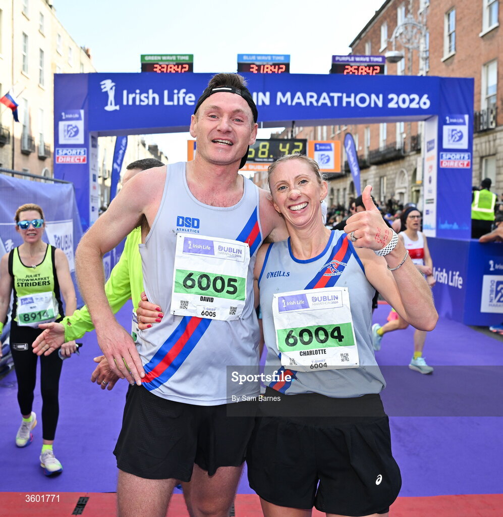 25 October 2026; David Gillick of Dundrum South Dublin AC, with his wife Charlotte Gillick of Dundrum South Dublin AC, after the 2026 Irish Life Dublin Marathon, as thousands of runners took to the streets of Dublin for the 45th running of the event. Photo by Sam Barnes/Sportsfile