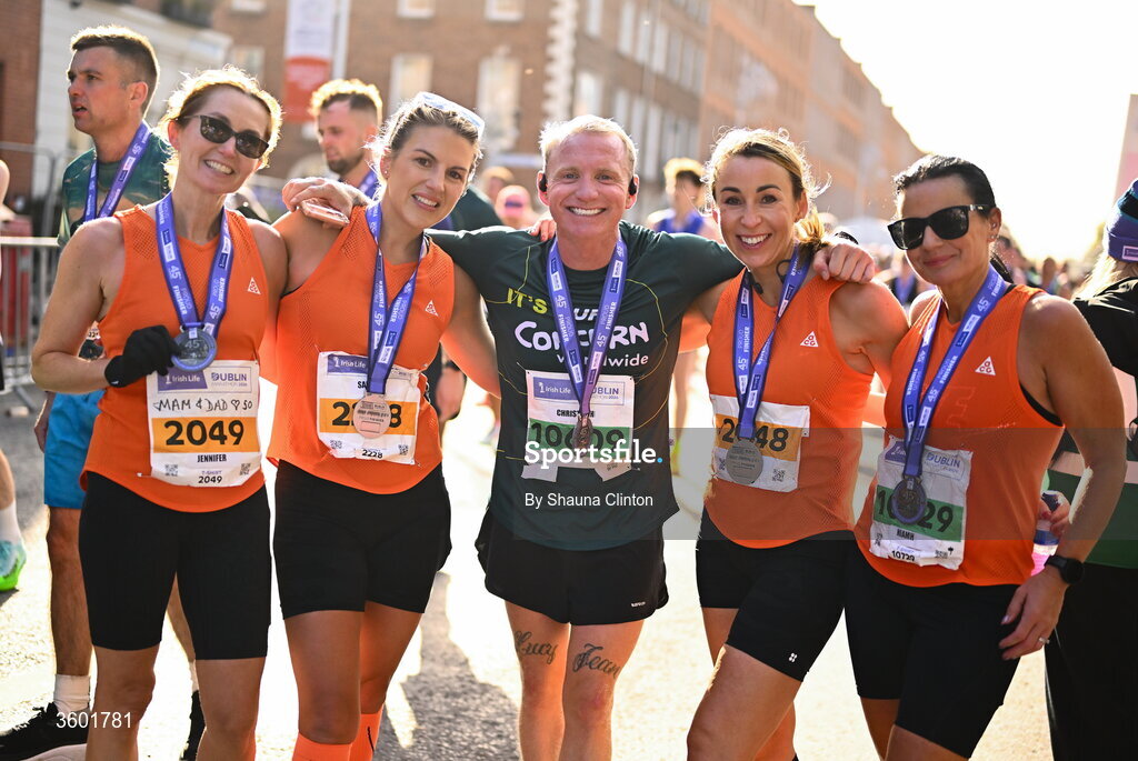 25 October 2026; Christopher Connolly with participants after the 2026 Irish Life Dublin Marathon, as thousands of runners took to the streets of Dublin for the 45th running of the event. Photo by Shauna Clinton/Sportsfile