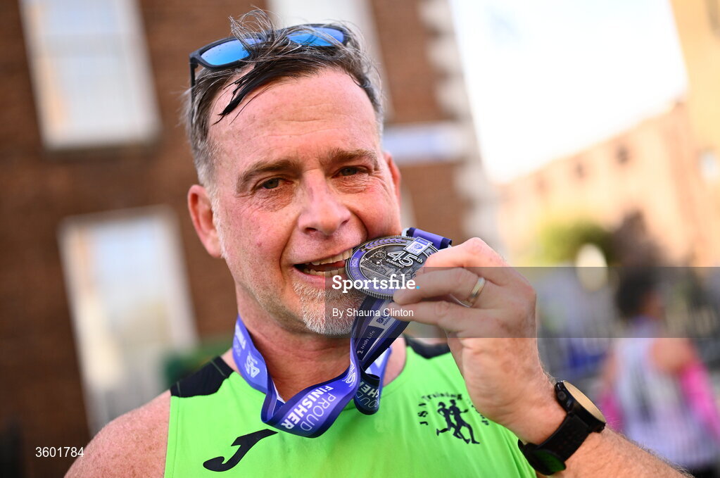 25 October 2026; Participants receive their finishers medals after the 2026 Irish Life Dublin Marathon, as thousands of runners took to the streets of Dublin for the 45th running of the event. Photo by Shauna Clinton/Sportsfile