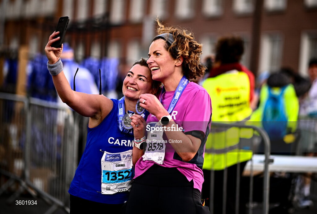 25 October 2026; Carmel Carton, left, and Eimear Quinn after the 2026 Irish Life Dublin Marathon, as thousands of runners took to the streets of Dublin for the 45th running of the event. Photo by Shauna Clinton/Sportsfile