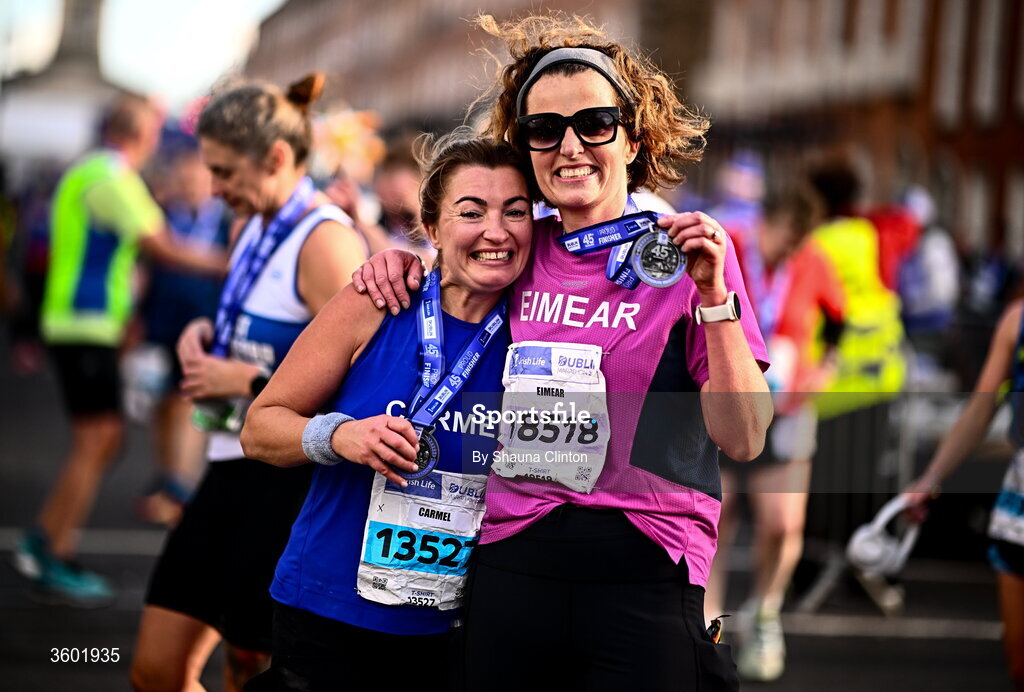 25 October 2026; Carmel Carton, left, and Eimear Quinn after the 2026 Irish Life Dublin Marathon, as thousands of runners took to the streets of Dublin for the 45th running of the event. Photo by Shauna Clinton/Sportsfile
