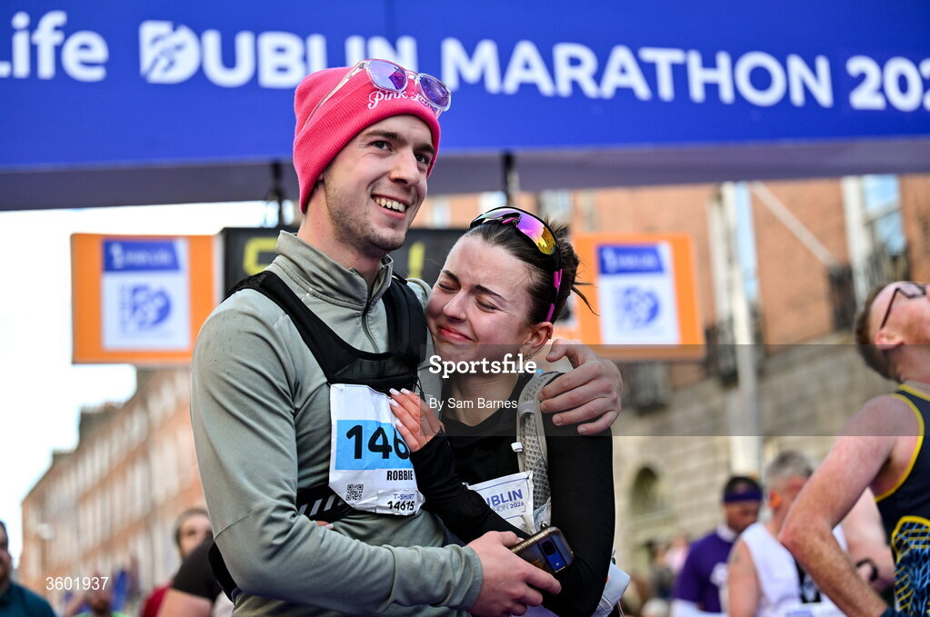 25 October 2026; Catelynn Walker, right, and Robbie Bowers after the 2026 Irish Life Dublin Marathon, as thousands of runners took to the streets of Dublin for the 45th running of the event. Photo by Sam Barnes/Sportsfile