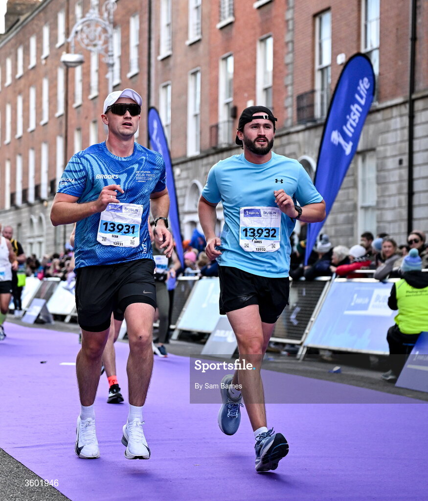 25 October 2026; Sean Greene, left, and James Greene during the 2026 Irish Life Dublin Marathon, as thousands of runners took to the streets of Dublin for the 45th running of the event. Photo by Sam Barnes/Sportsfile