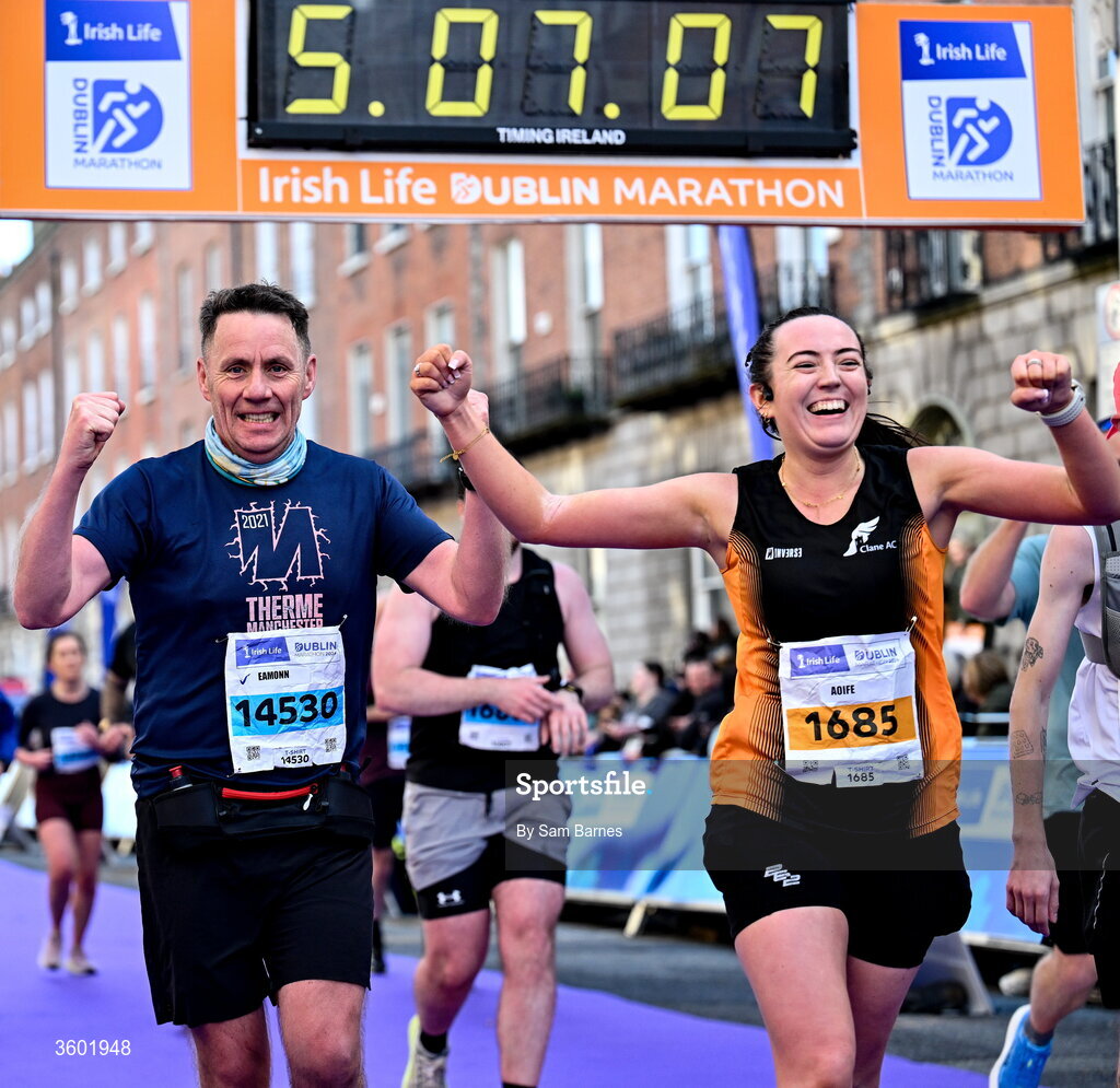 25 October 2026; Eamonn O' Hara of Clane AC, Kildare, left, and Aoife O' Sullivan of Clane AC, Kildare, after the 2026 Irish Life Dublin Marathon, as thousands of runners took to the streets of Dublin for the 45th running of the event. Photo by Sam Barnes/Sportsfile