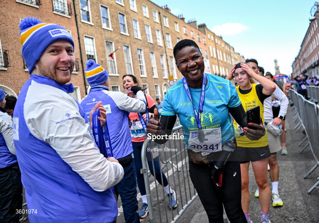 25 October 2026; Monica Pumpkin collects her medal after the 2026 Irish Life Dublin Marathon, as thousands of runners took to the streets of Dublin for the 45th running of the event. Photo by Sam Barnes/Sportsfile