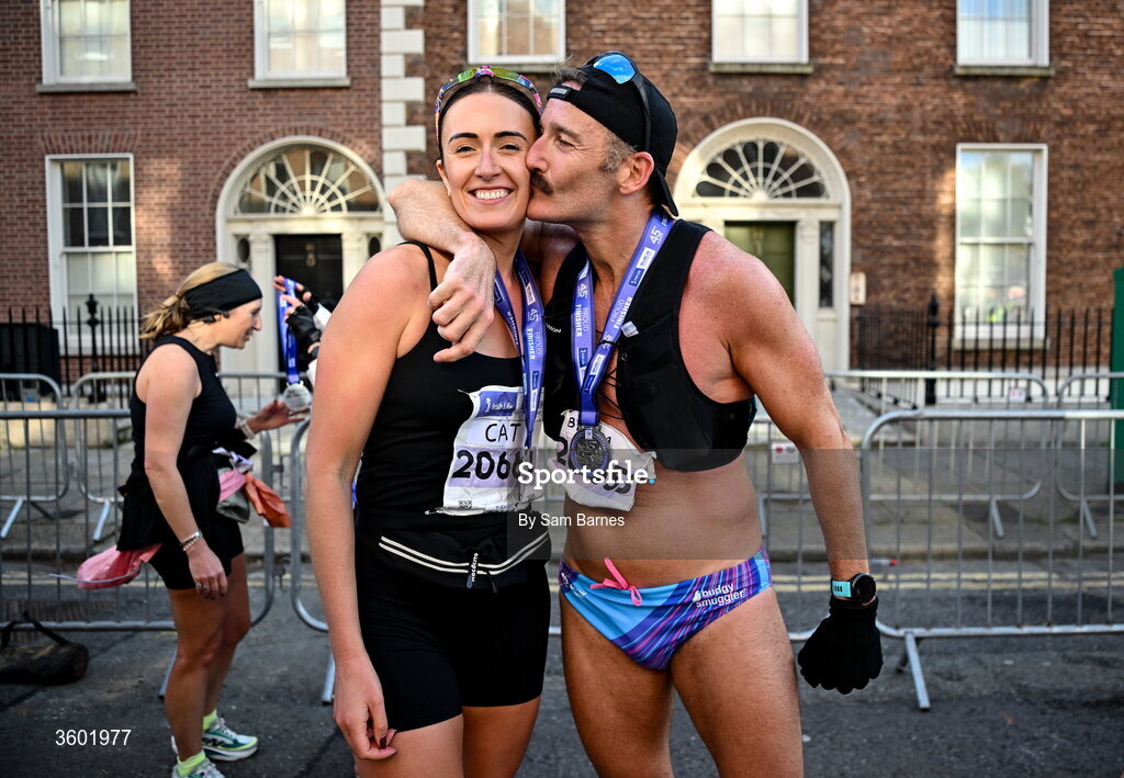 25 October 2026; Paul Byrom, right, and Cat Mc Keown after the 2026 Irish Life Dublin Marathon, as thousands of runners took to the streets of Dublin for the 45th running of the event. Photo by Sam Barnes/Sportsfile