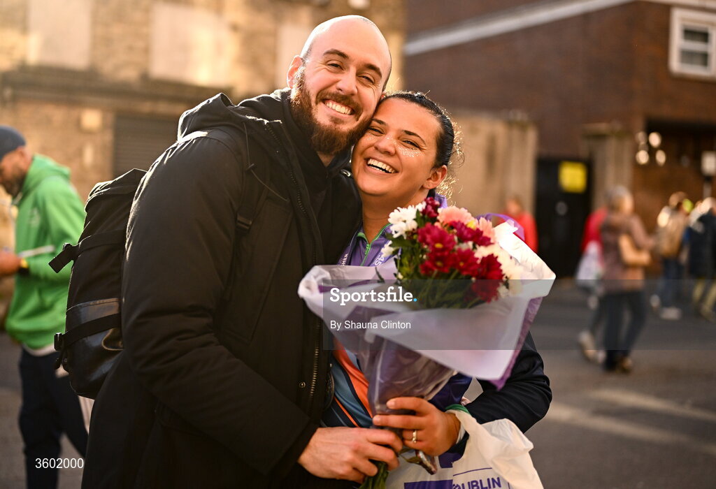 25 October 2026; Participants with family after the 2026 Irish Life Dublin Marathon, as thousands of runners took to the streets of Dublin for the 45th running of the event. Photo by Shauna Clinton/Sportsfile