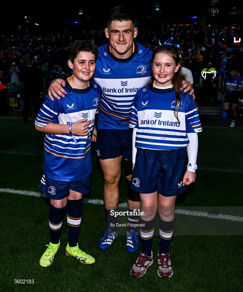 24 October 2026; Dan Sheehan of Leinster with mascots before the United Rugby Championship match between Leinster and Munster at the Aviva Stadium in Dublin. Photo by David Fitzgerald/Sportsfile