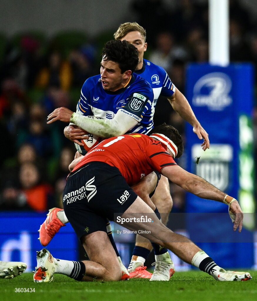 24 October 2026; Joey Carbery of Leinster is tackled by Shane Daly of Munster during the United Rugby Championship match between Leinster and Munster at the Aviva Stadium in Dublin. Photo by Shauna Clinton/Sportsfile