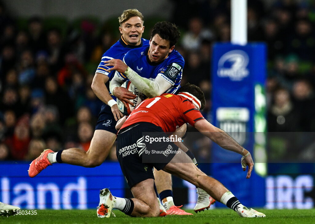 24 October 2026; Joey Carbery of Leinster is tackled by Shane Daly of Munster during the United Rugby Championship match between Leinster and Munster at the Aviva Stadium in Dublin. Photo by Shauna Clinton/Sportsfile