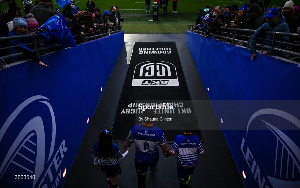 24 October 2026; Leinster captain Dan Sheehan, centre, is joined by mascots as they walk out onto the pitch before the United Rugby Championship match between Leinster and Munster at the Aviva Stadium in Dublin. Photo by Shauna Clinton/Sportsfile