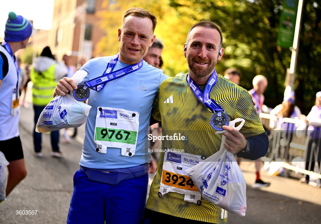 25 October 2026; Mick Hill, left, and Sam Wharin after the 2026 Irish Life Dublin Marathon. Photo by Shauna Clinton/Sportsfile