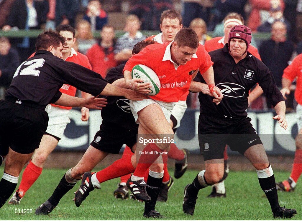 26 September 1998; Cian Mahony, Munster, is tackled by Tristan Davies, left, Matthew McCarthy and Brett Sinkinson, right, Neath. European Rugby Cup, Munster v Neath, Musgrave Park, Cork. Picture credit: Matt Browne / SPORTSFILE