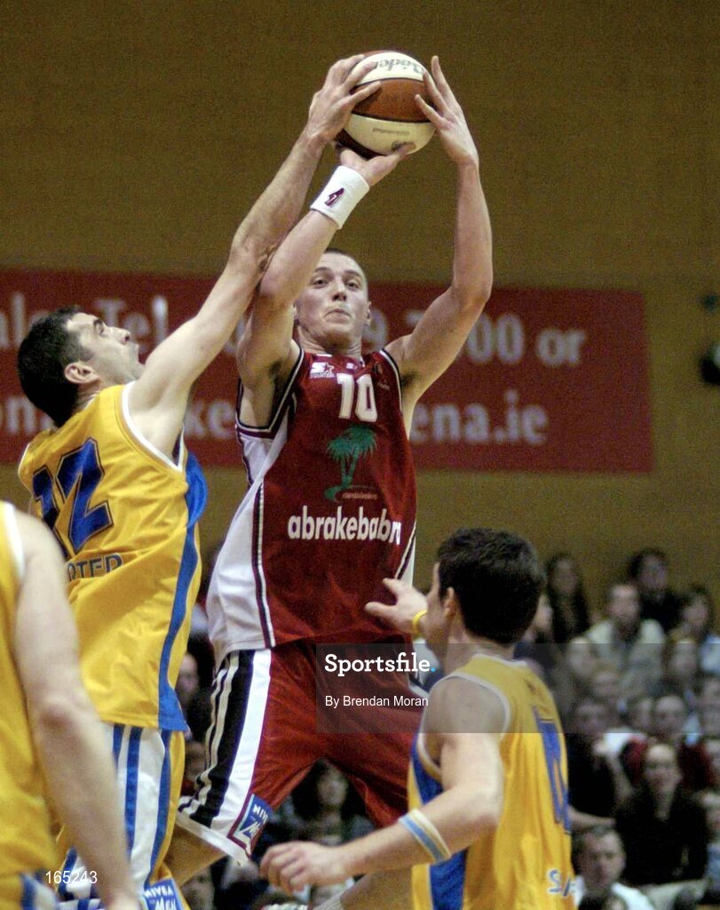 30 January 2005; Kieran Donaghy, Abrakebabra Tigers, Tralee, in action against Stephen McGuirk, Roma St Vincent's. National Cup, Senior Men's Final, Abrakebabra Tigers, Tralee v Roma St Vincent's, ESB Arena, Tallaght, Dublin. Picture credit; Brendan Moran / SPORTSFILE