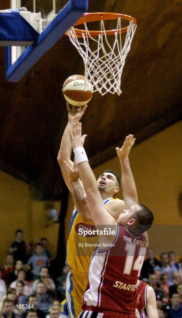 30 January 2005; Mike Trimmer, Roma St Vincent's, in action against Micheal Quirke, Abrakebabra Tigers, Tralee. National Cup, Senior Men's Final, Abrakebabra Tigers, Tralee v Roma St Vincent's, ESB Arena, Tallaght, Dublin. Picture credit; Brendan Moran / SPORTSFILE