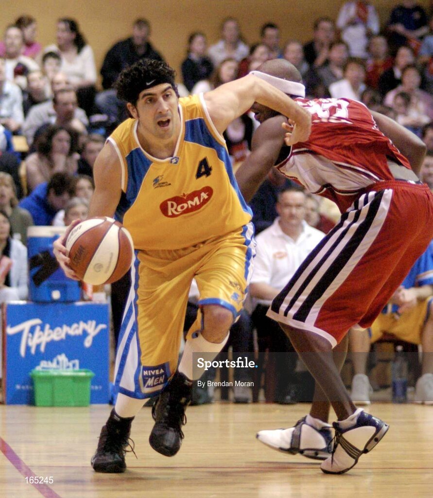 30 January 2005; Paul Tonkovich, Roma St Vincent's, in action against Roy Smallwood, Abrakebabra Tigers, Tralee. National Cup, Senior Men's Final, Abrakebabra Tigers, Tralee v Roma St Vincent's, ESB Arena, Tallaght, Dublin. Picture credit; Brendan Moran / SPORTSFILE