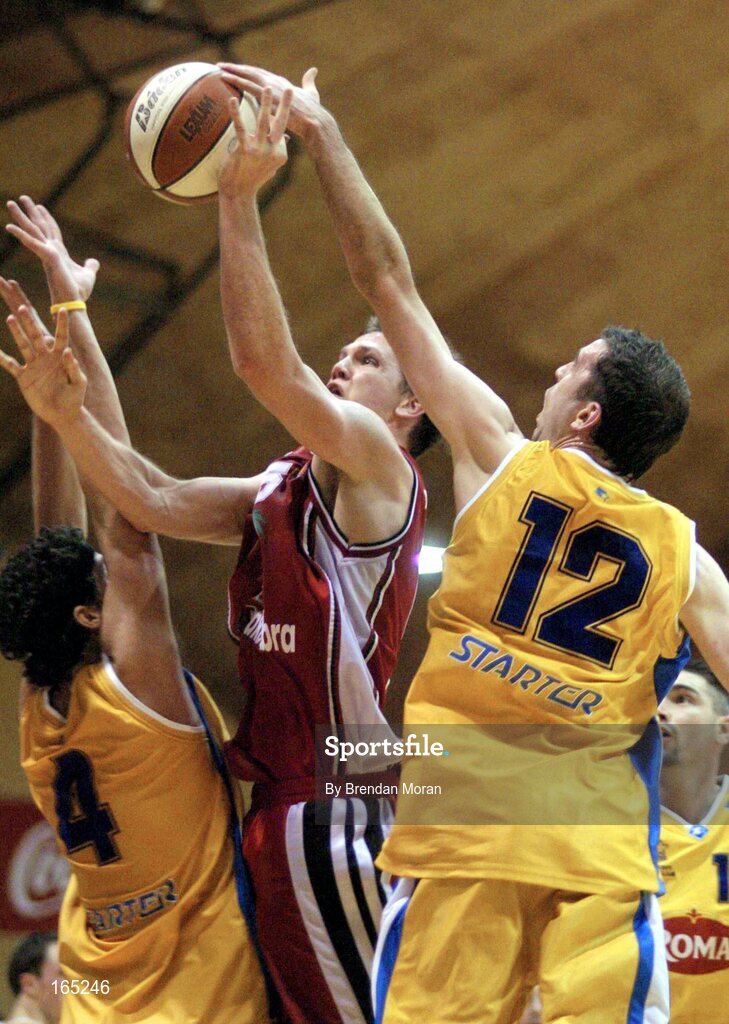 30 January 2005; Luke O'Hea, Abrakebabra Tigers, Tralee, in action against Paul Tonkovich and Stephen McGuirk (12), Roma St Vincent's. National Cup, Senior Men's Final, Abrakebabra Tigers, Tralee v Roma St Vincent's, ESB Arena, Tallaght, Dublin. Picture credit; Brendan Moran / SPORTSFILE