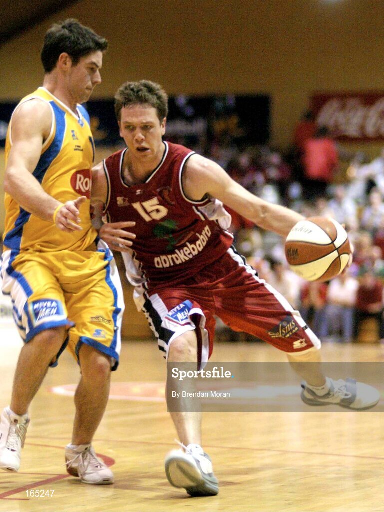 30 January 2005; Luke O'Hea, Abrakebabra Tigers, Tralee, in action against Pete Madsen, Roma St Vincent's. National Cup, Senior Men's Final, Abrakebabra Tigers, Tralee v Roma St Vincent's, ESB Arena, Tallaght, Dublin. Picture credit; Brendan Moran / SPORTSFILE