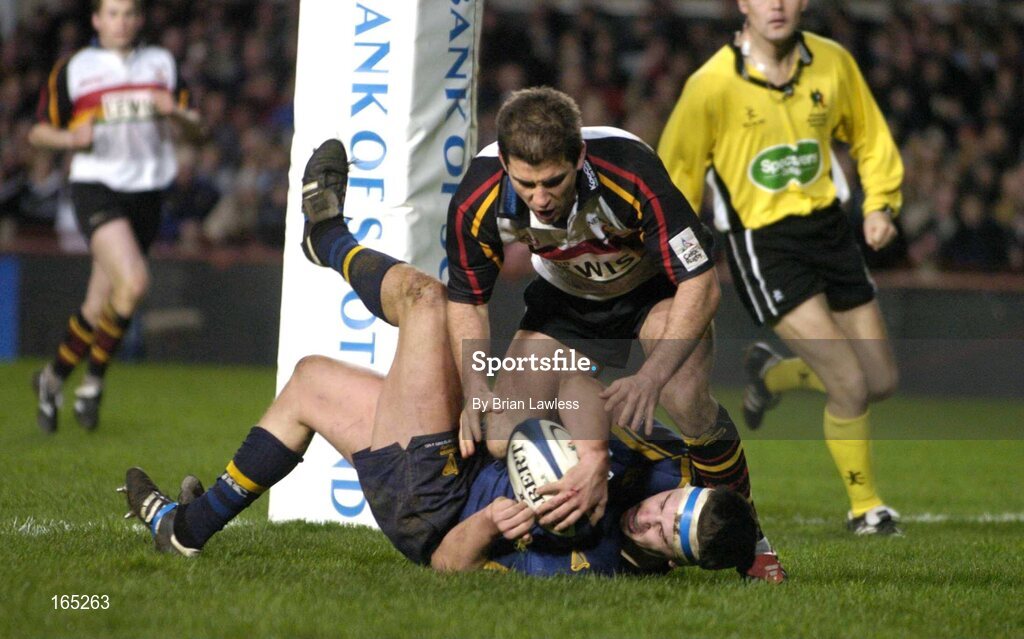 30 January 2005; Niall Ronan, Leinster, goes over for his sides fifth try despite the attentions of Gareth Baber, The Dragons. Celtic League 2004-2005, Pool 1, Leinster v The Dragons, Lansdowne Road, Dublin. Picture credit; Brian Lawless / SPORTSFILE
