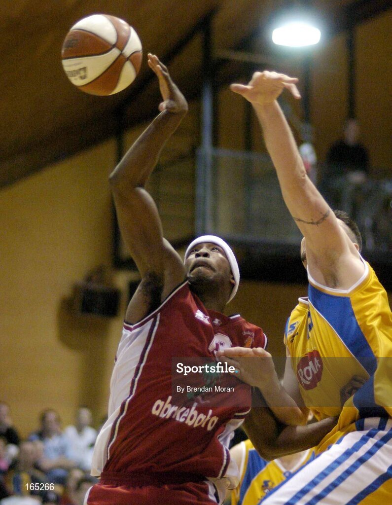 30 January 2005; Roy Smallwood, Abrakebabra Tigers, Tralee, in action against Mike Trimmer, Roma St Vincent's. National Cup, Senior Men's Final, Abrakebabra Tigers, Tralee v Roma St Vincent's, ESB Arena, Tallaght, Dublin. Picture credit; Brendan Moran / SPORTSFILE