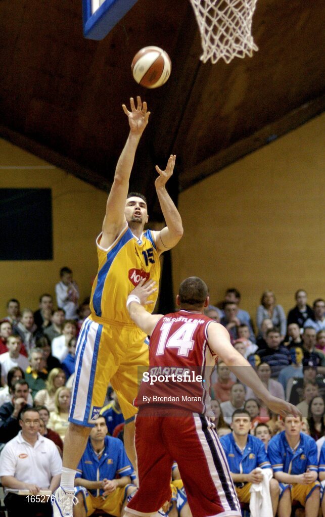 30 January 2005; Mike Trimmer, Roma St Vincent's, in action against Micheal Quirke, Abrakebabra Tigers, Tralee. National Cup, Senior Men's Final, Abrakebabra Tigers, Tralee v Roma St Vincent's, ESB Arena, Tallaght, Dublin. Picture credit; Brendan Moran / SPORTSFILE