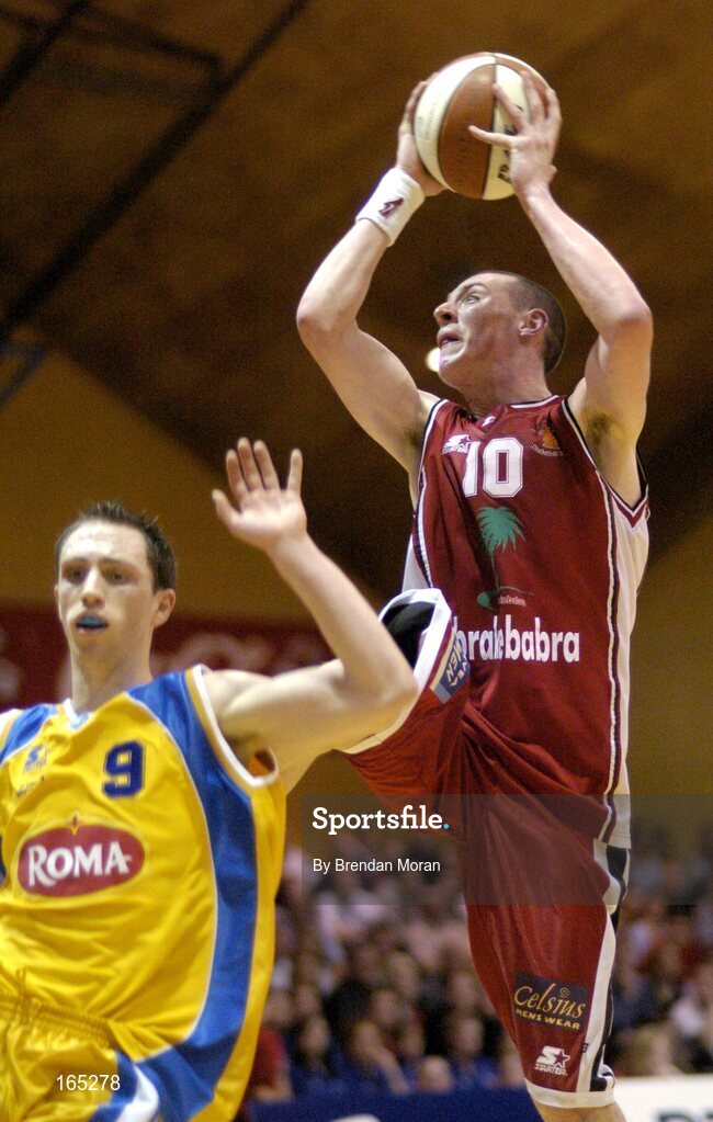 30 January 2005; Kieran Donaghy, Abrakebabra Tigers, Tralee, in action against Emmet Donnelly, Roma St Vincent's. National Cup, Senior Men's Final, Abrakebabra Tigers, Tralee v Roma St Vincent's, ESB Arena, Tallaght, Dublin. Picture credit; Brendan Moran / SPORTSFILE