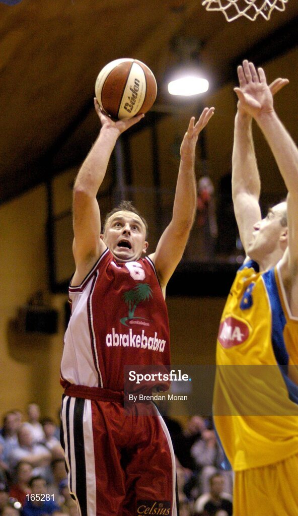 30 January 2005; John Teahan, Abrakebabra Tigers, Tralee, in action against Dave Donnelly, Roma St Vincent's. National Cup, Senior Men's Final, Abrakebabra Tigers, Tralee v Roma St Vincent's, ESB Arena, Tallaght, Dublin. Picture credit; Brendan Moran / SPORTSFILE