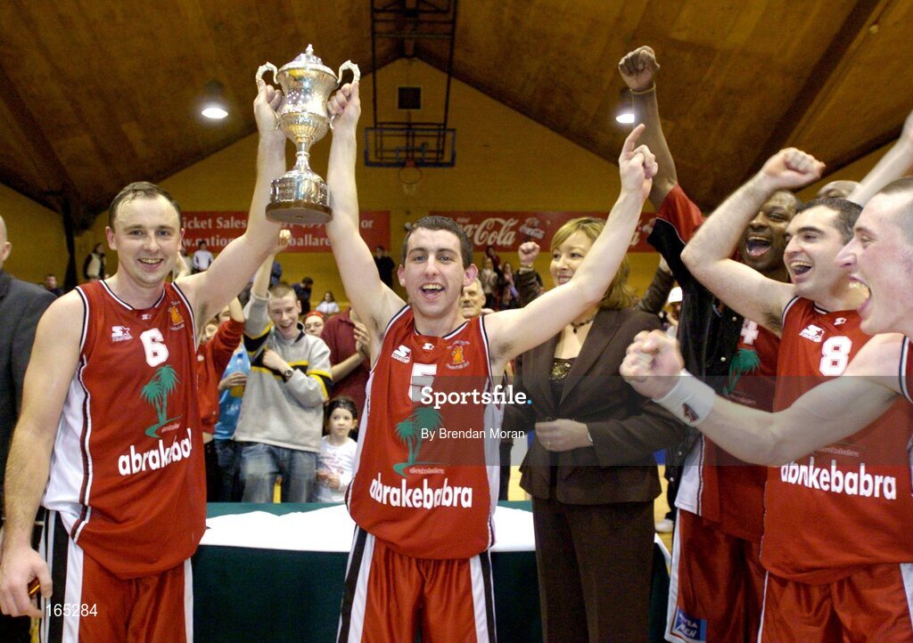 30 January 2005; Abrakebabra Tigers co-captains John Teahan and Kevin O'Donoghue, right, lift the cup watched by team-mates Roscoe Patterson, Liam Brosnan (8) and Kieran Donaghy. National Cup, Senior Men's Final, Abrakebabra Tigers, Tralee v Roma St Vincent's, ESB Arena, Tallaght, Dublin. Picture credit; Brendan Moran / SPORTSFILE