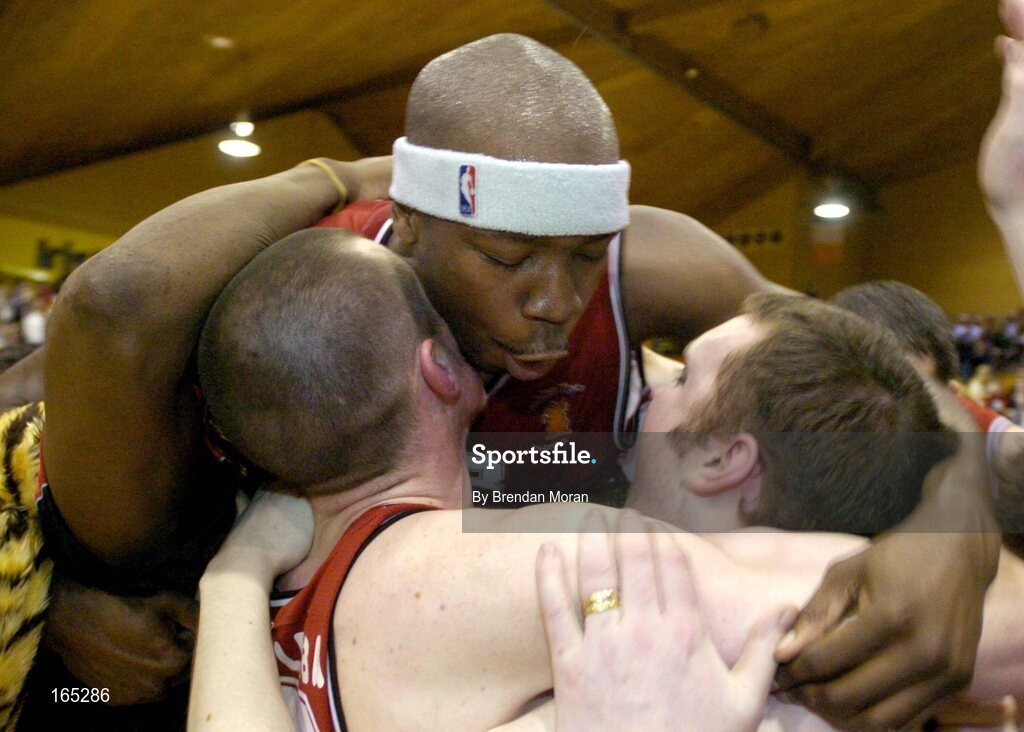 30 January 2005; Roy Smallwood, top, Abrakebabra Tigers, Tralee, celebrates with team-mates Kieran Donaghy and Kevin O'Donoghue, right, after defeating Roma St Vincent's. National Cup, Senior Men's Final, Abrakebabra Tigers, Tralee v Roma St Vincent's, ESB Arena, Tallaght, Dublin. Picture credit; Brendan Moran / SPORTSFILE