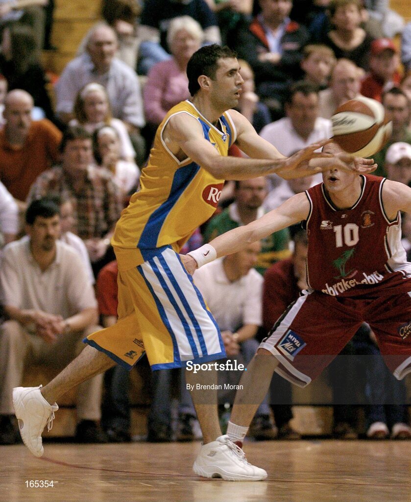 30 January 2005; Stephen McGuirk, Roma St Vincent's, in action against Kieran Donaghy, Abrakebabra Tigers, Tralee. National Cup, Senior Men's Final, Abrakebabra Tigers, Tralee v Roma St Vincent's, ESB Arena, Tallaght, Dublin. Picture credit; Brendan Moran / SPORTSFILE