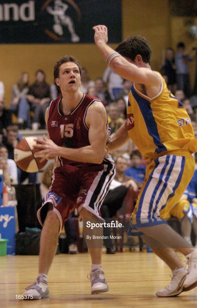 30 January 2005; Luke O'Hea, Abrakebabra Tigers, Tralee, in action against Pete Madsen, Roma St Vincent's. National Cup, Senior Men's Final, Abrakebabra Tigers, Tralee v Roma St Vincent's, ESB Arena, Tallaght, Dublin. Picture credit; Brendan Moran / SPORTSFILE