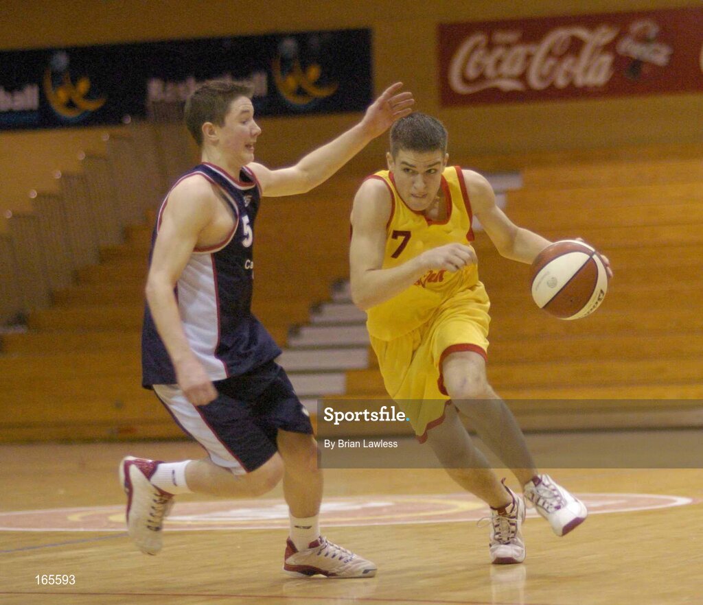 3 February 2005; Keith Anderson, St. Fintan's, Sutton, in action against Peter Finn, Calasanctius, Oranmore. All-Ireland Schools Cup, U19 A Boys Final, St. Fintan's, Sutton, Dublin v Calasanctius, Oranmore, Galway, National Basketball Arena, Tallaght, Dublin. Picture credit; Brian Lawless / SPORTSFILE
