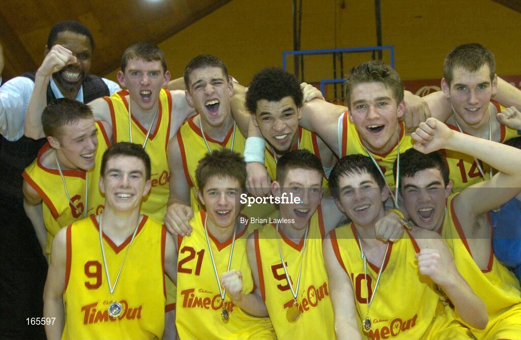 3 February 2005; The St. Fintan's, Sutton, team and coach Jerome Westbrooks celebrate after victory in the final. All-Ireland Schools Cup, U19 A Boys Final, St. Fintan's, Sutton, Dublin v Calasanctius, Oranmore, Galway, National Basketball Arena, Tallaght, Dublin. Picture credit; Brian Lawless / SPORTSFILE