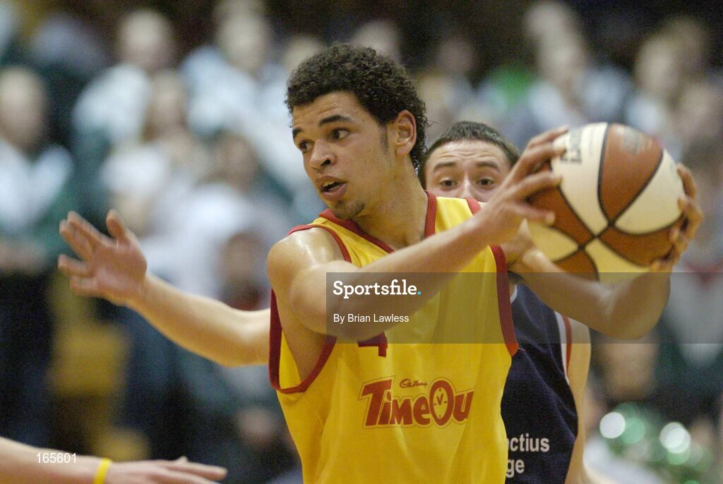 3 February 2005; Aaron Westbrooks, St. Fintan's, Sutton, in action against Conor Leydon, Calasanctius, Oranmore. All-Ireland Schools Cup, U19 A Boys Final, St. Fintan's, Sutton, Dublin v Calasanctius, Oranmore, Galway, National Basketball Arena, Tallaght, Dublin. Picture credit; Brian Lawless / SPORTSFILE