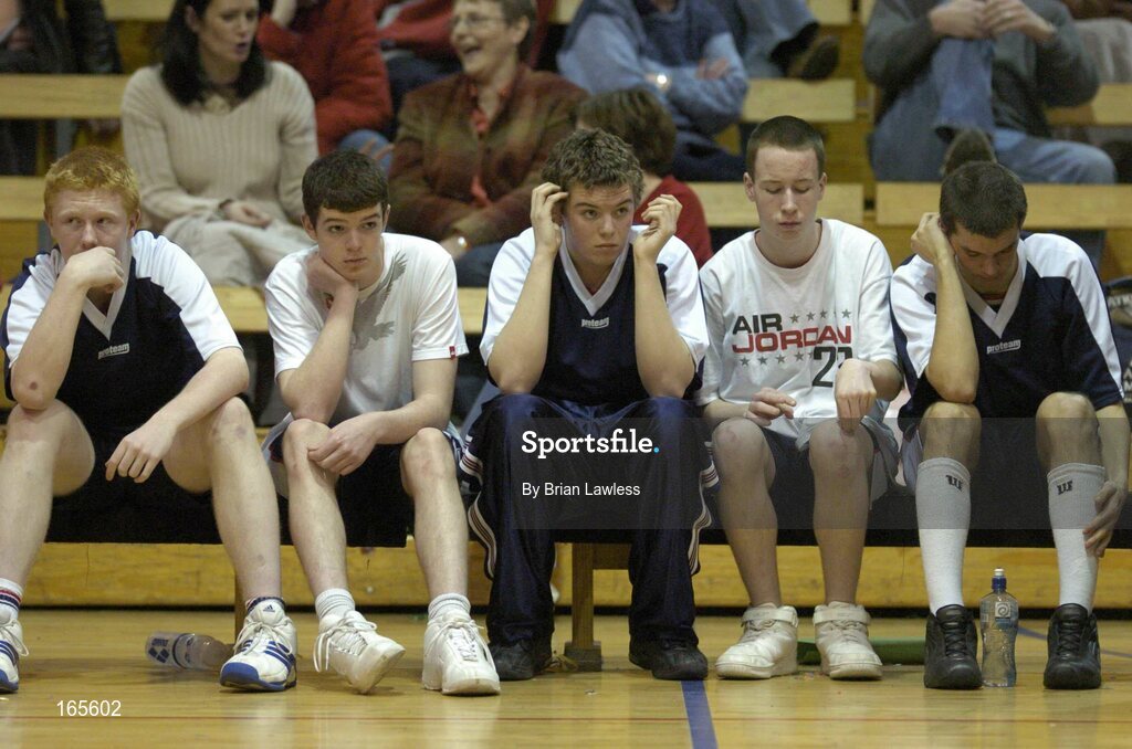 3 February 2005; Members of the Calasanctius team watch the dying moments of the match. All-Ireland Schools Cup, U19 A Boys Final, St. Fintan's, Sutton, Dublin v Calasanctius, Oranmore, Galway, National Basketball Arena, Tallaght, Dublin. Picture credit; Brian Lawless / SPORTSFILE