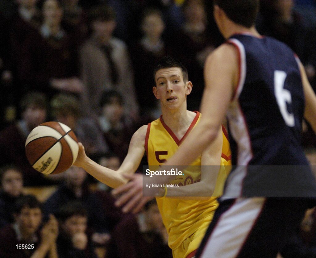 3 February 2005; Jody O'Neill, St. Fintan's, Sutton, in action against Danny Finn, Calasanctius, Oranmore. All-Ireland Schools Cup, U19 A Boys Final, St. Fintan's, Sutton, Dublin v Calasanctius, Oranmore, Galway, National Basketball Arena, Tallaght, Dublin. Picture credit; Brian Lawless / SPORTSFILE