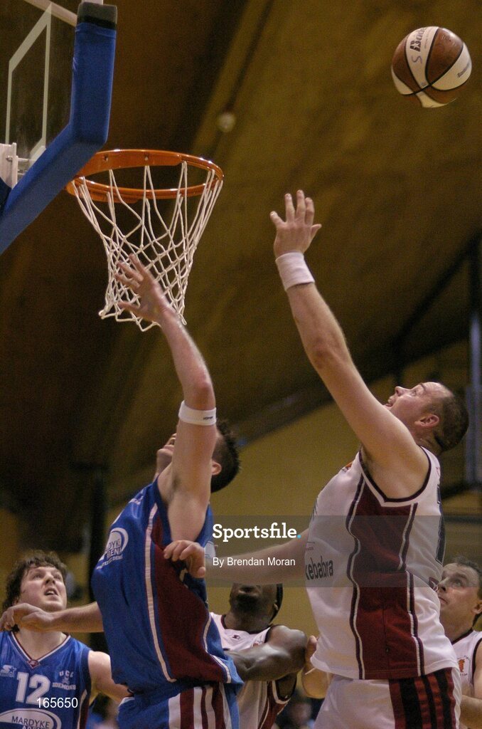 29 January 2005; Damian Matacz, Mardyke UCC Demons, in action against Micheal Quirke, Abrakebabra Tigers, Tralee. National Cup, Senior Men's Semi-Final, Mardyke UCC Demons v Abrakebabra Tigers, Tralee, ESB Arena, Tallaght, Dublin. Picture credit; Brendan Moran / SPORTSFILE