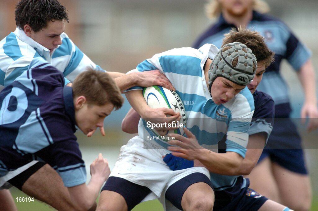 9 February 2005; David Moore, Blackrock College, is tackled by St. Michaels' David Rowan, left and Michael Twomey, Leinster Schools Rugby Cup, Quarter Final, Blackrock College v St. Michaels, Donnybrook, Dublin. Picture credit; Pat Murphy / SPORTSFILE
