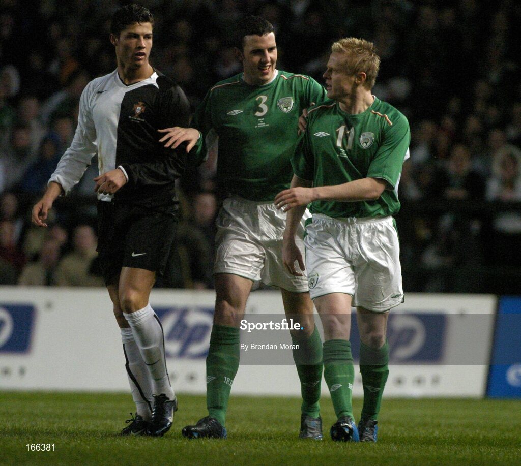 9 February 2005; John O'Shea, Republic of Ireland, seperates team-mate Damien Duff from Cristiano Ronaldo, Portugal. International Friendly, Republic of Ireland v Portugal, Lansdowne Road, Dublin. Picture credit; Brendan Moran / SPORTSFILE