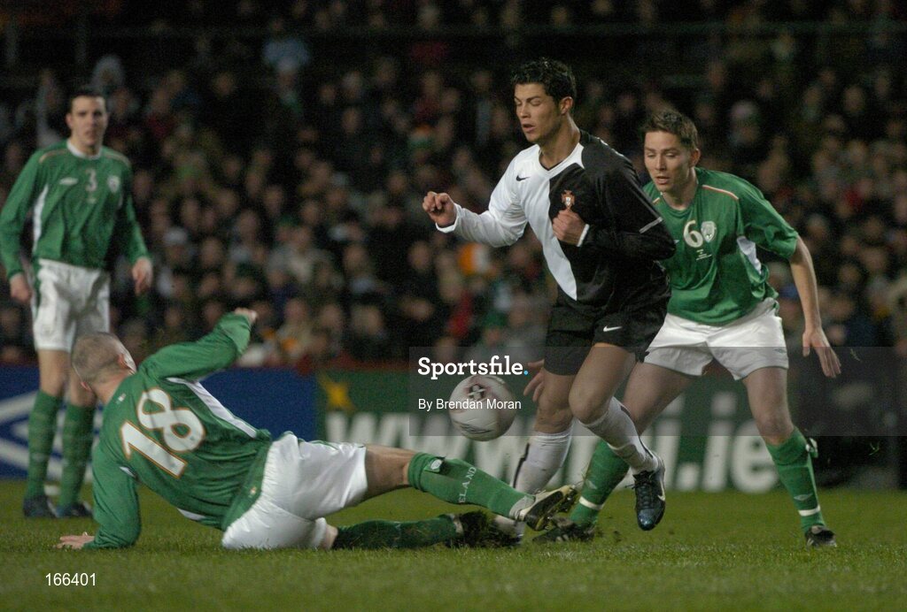 9 February 2005; Cristiano Ronaldo, Portugal, in action against Graham Kavanagh (18) and Matt Holland, Republic of Ireland. International Friendly, Republic of Ireland v Portugal, Lansdowne Road, Dublin. Picture credit; Brendan Moran / SPORTSFILE